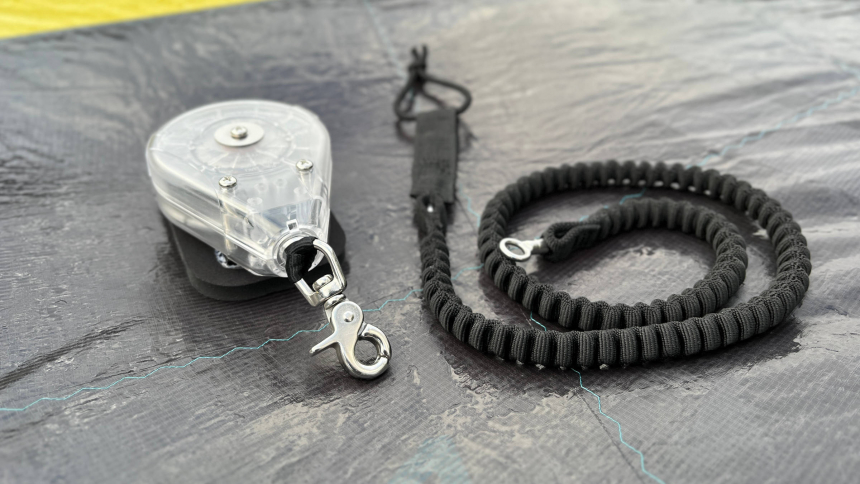 Inside the box, spring tension ensures automatic retraction